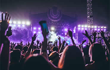 Picture of a crowd in front of a stage